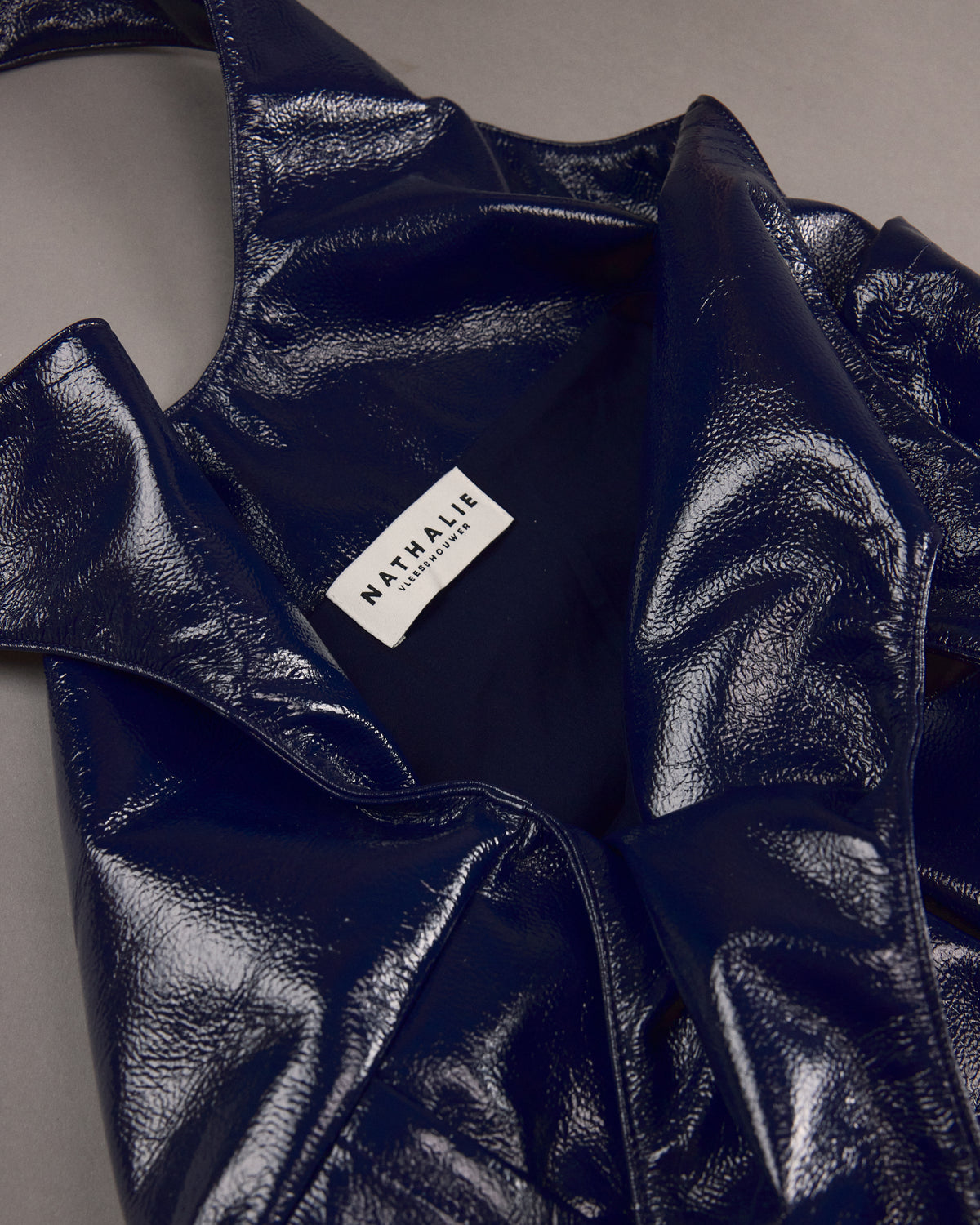Jac handtas in academy blue faux leather