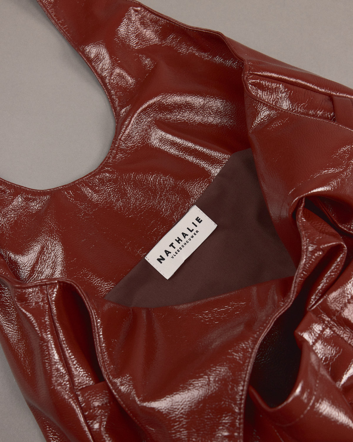 Jac handtas in maroon faux leather