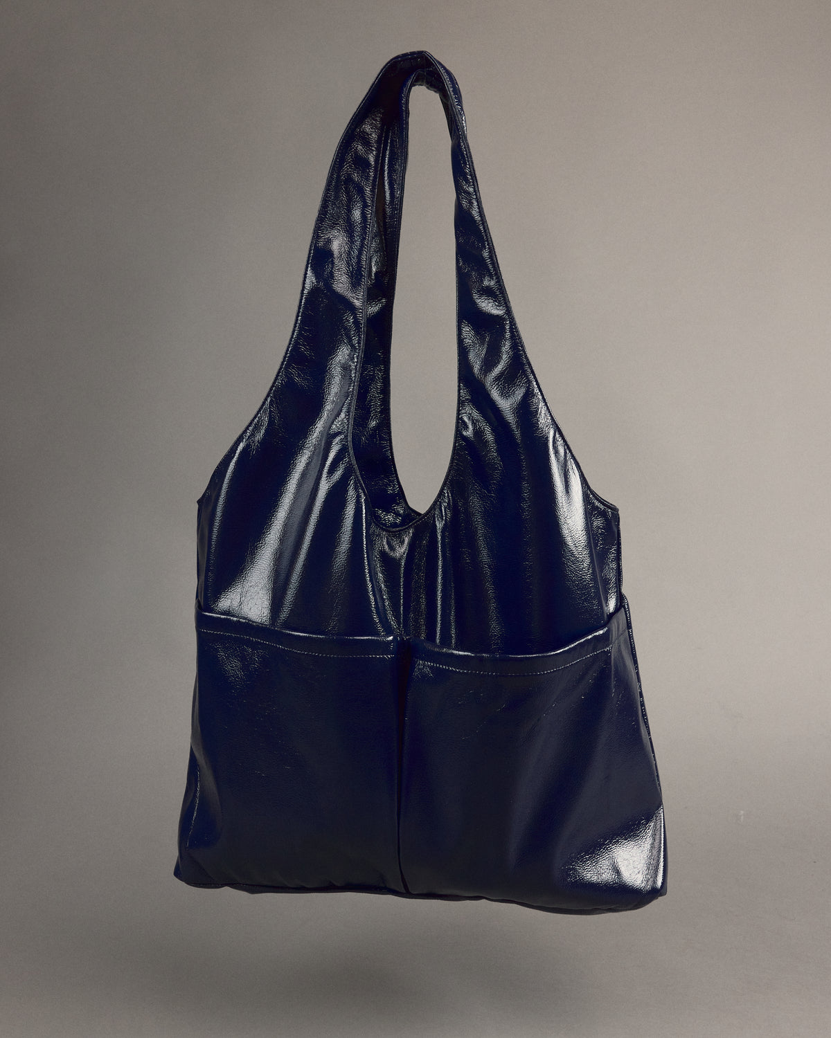 Jac handtas in academy blue faux leather