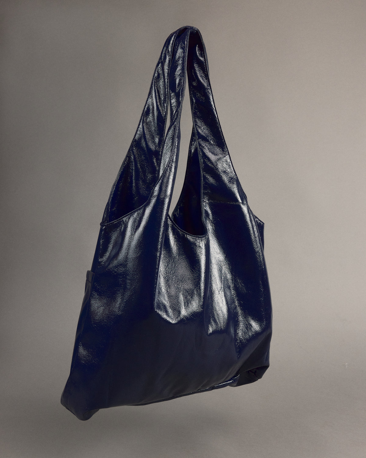 Jac handtas in academy blue faux leather