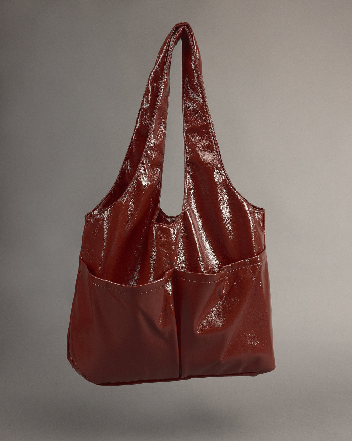 Jac handtas in maroon faux leather