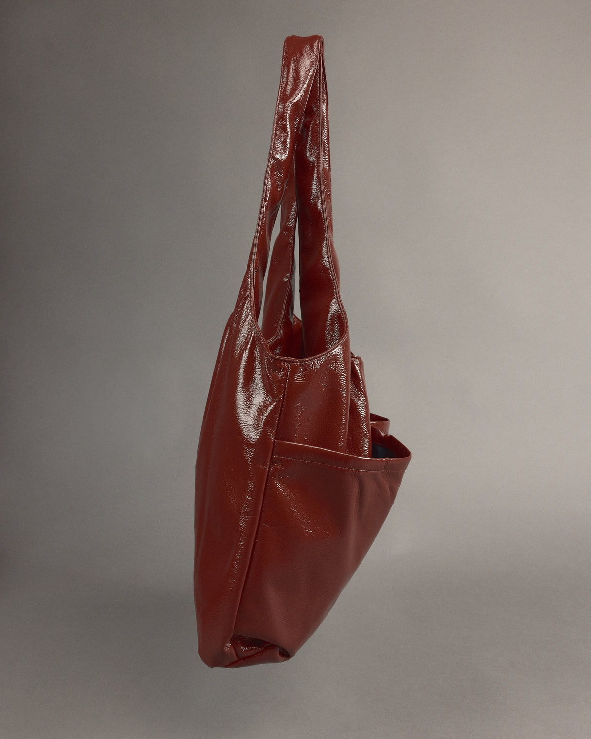 Jac handtas in maroon faux leather