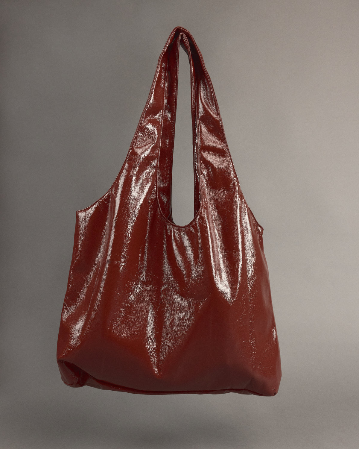 Jac handtas in maroon faux leather