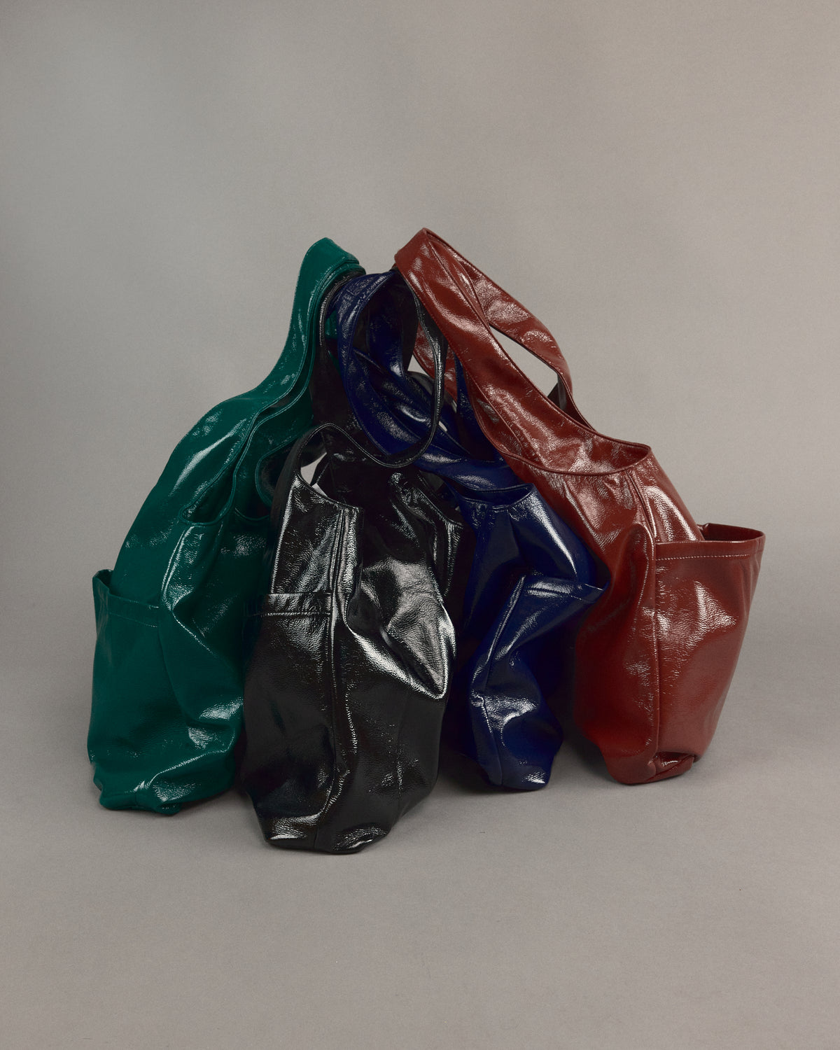 Jac handtas in maroon faux leather
