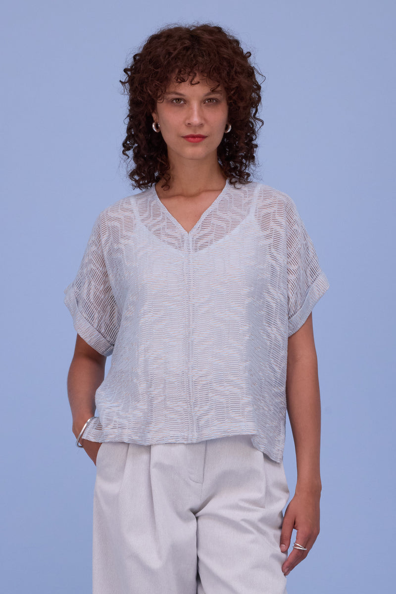 Faro blouse in transparent sky blue stripes