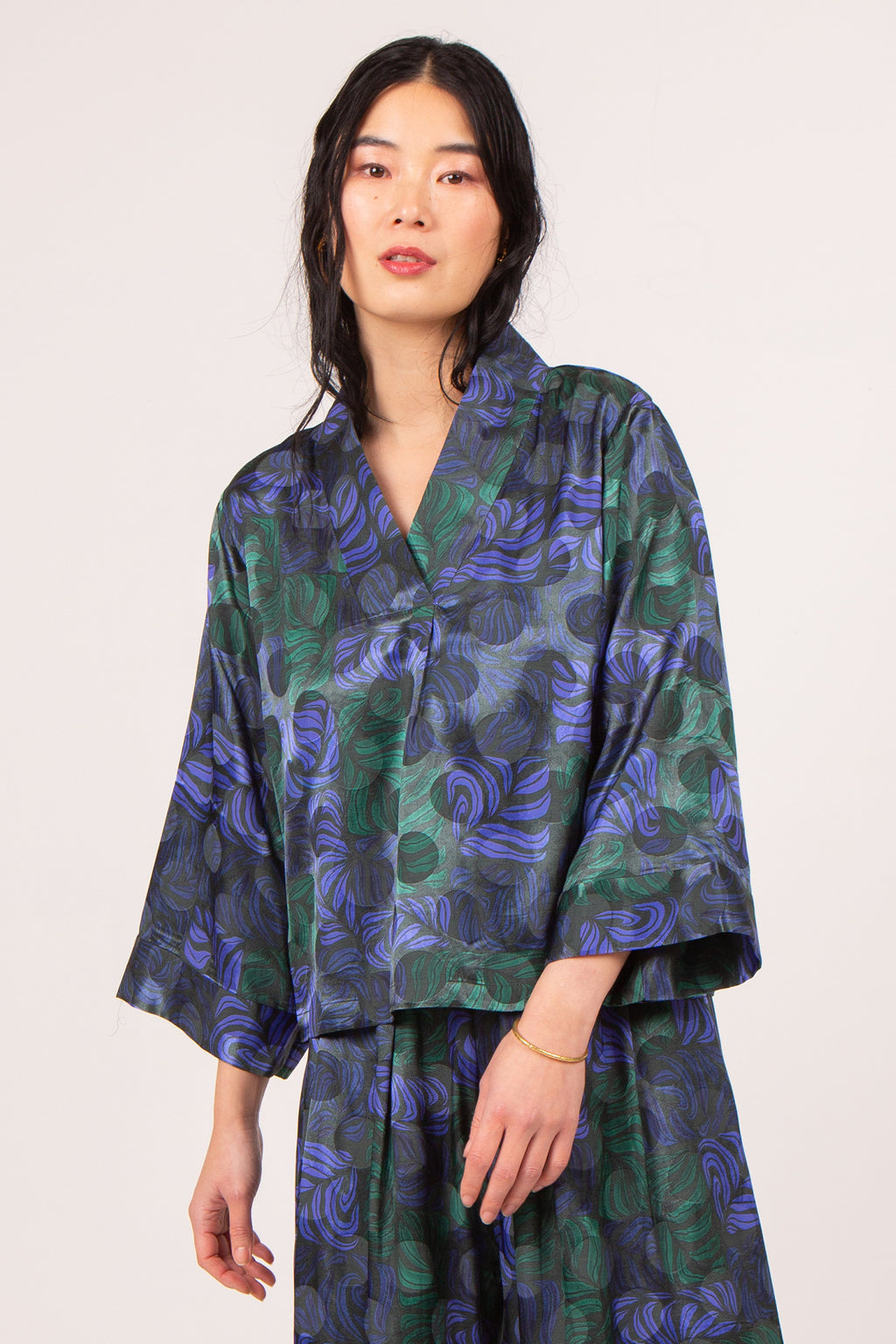 Clotilde blouse in green blue leaves