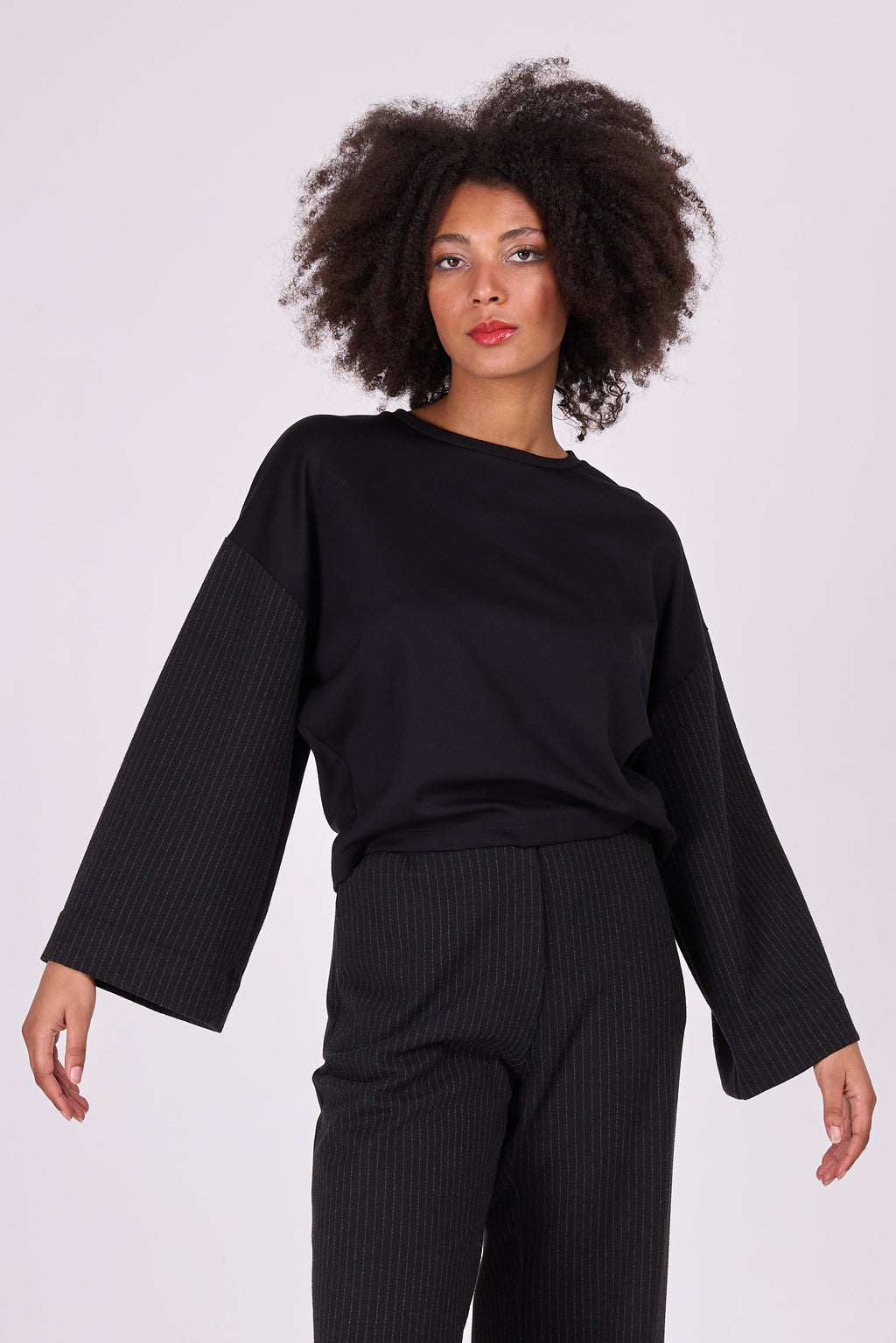 Ed black sweater with pinstriped sleeves