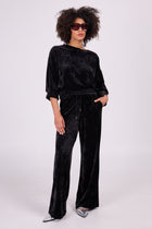 Zuka black velvet trousers